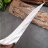 Sharp-edged stainless steel boning knife for meat and fish