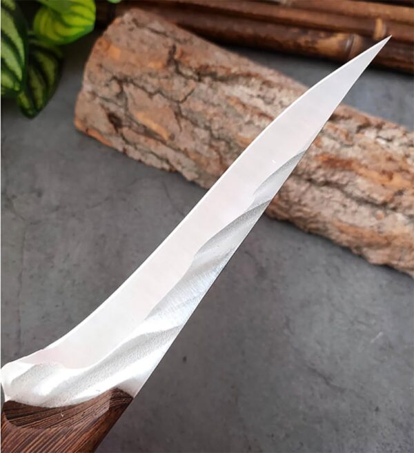 Sharp-edged stainless steel boning knife for meat and fish