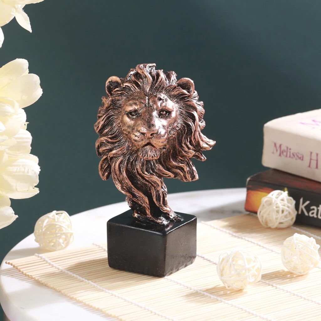 Golden lion head sculpture made of resin for modern interiors