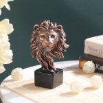Golden lion head sculpture made of resin for modern interiors