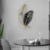 Elegant wall clock with metal art sculpture – perfect for contemporary interiors