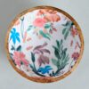 Natural mango wood round bowl with artistic detailing