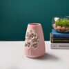 Floral carved pink vase for elegant home interiors