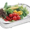 Rectangular stainless steel strainer basket for rinsing produce.