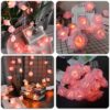 Artificial pink rose flower LED string lights for romantic lighting