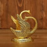 Elegant swan shape golden napkin holder made of oxidized metal