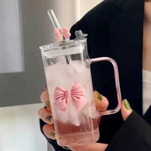 Square glass cup with lid and decorative bow straw for drinks