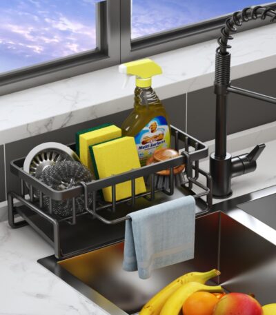 Close-up of metal sponge holder attached to kitchen sink for organization.
