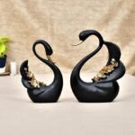 Romantic swan couple figurine symbolizing love and harmony