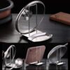 Lid and utensil rest stand made of stainless steel