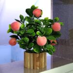 Realistic artificial fruit plant in pot for indoor decoration