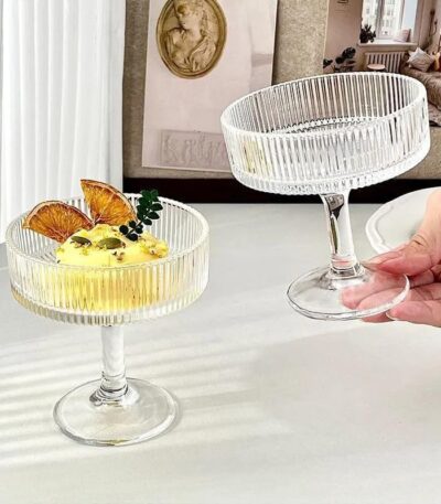 European tall ice cream cup filled with creamy sundae and toppings