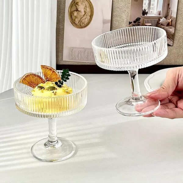 European tall ice cream cup filled with creamy sundae and toppings