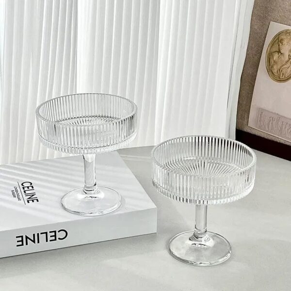 Crystal tall dessert cup holding fruit parfait and cream