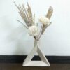 Stylish ceramic triangle flower vase with artificial floral arrangement