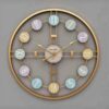 Golden finish artistic wall clock with intricate design pattern