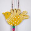 Metal wall hanging of colorful birds with butterfly design