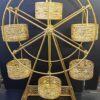 Elegant gold Ferris wheel dessert stand for cupcakes and mini cakes”
