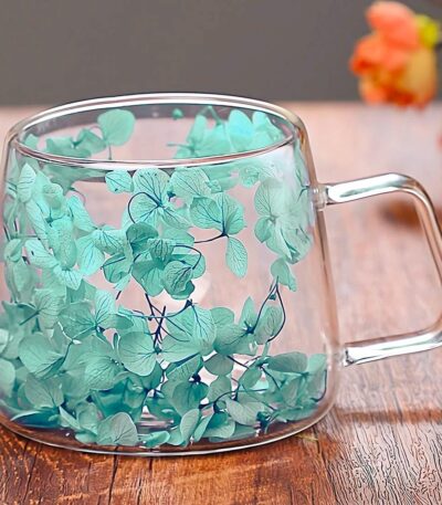 Double wall borosilicate glass cup with dried flower design
