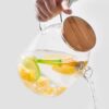 Borosilicate glass water jug with wooden lid for hot and cold beverages