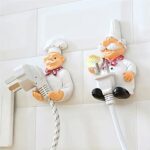 Resin chef plug holder mounted on kitchen wall for power socket organization
