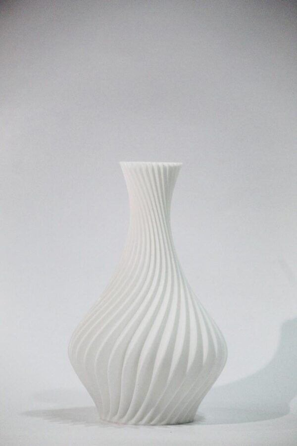 Stylish ribbed table vase for floral arrangements