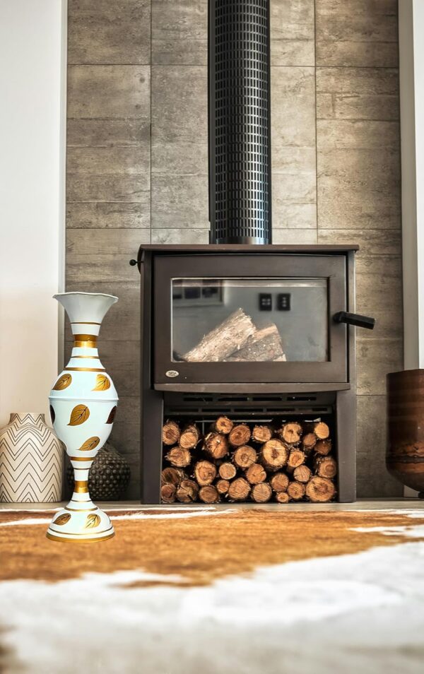 Metal flower vase with leaf motif ideal for table and shelf decoration