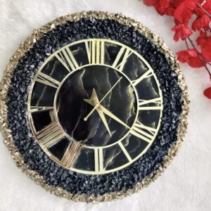 Designer black and golden resin wall clock with decorative stones