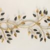 Stylish metal leaf wall hanging in gold finish