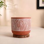 Decorative brown terracotta pot with leaf design for artificial plants