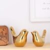 Premium ceramic golden bird sculpture for home and office décor