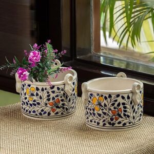 Handpainted ceramic flower pot with colorful artistic design