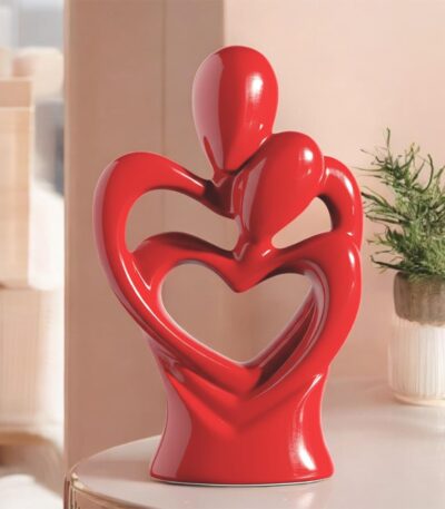 Hugging couple ceramic sculpture with heart shape romantic design