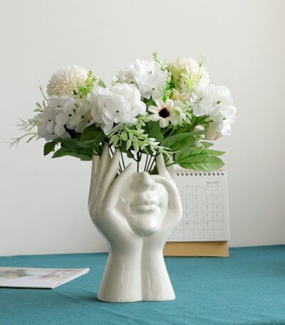 Human face art ceramic vase with modern sculptural design