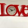 Red love table clock with heart design for romantic home décor