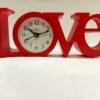 Stylish red love table clock for modern home interior