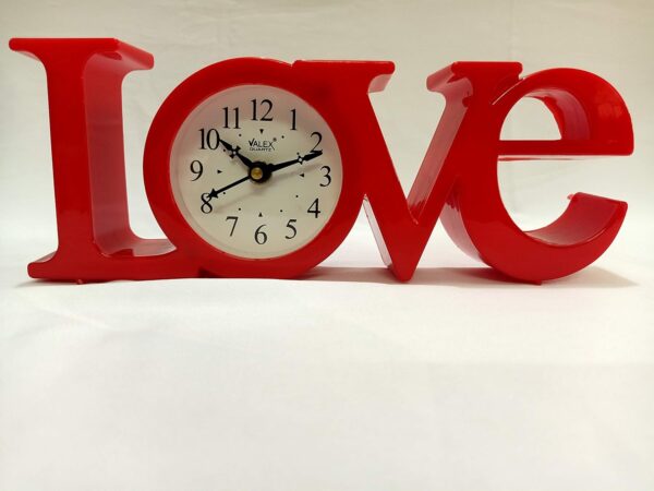 Stylish red love table clock for modern home interior