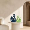 Modern piano finish ceramic swan couple for tabletop decor