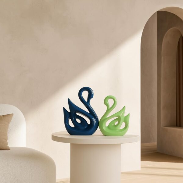 Modern piano finish ceramic swan couple for tabletop decor