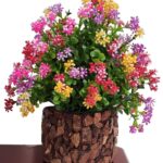 Plastic multicolor artificial flower plant with stylish coconut pot for home décor