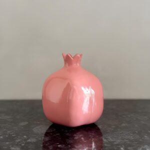 Hand-finished ceramic pomegranate décor accent piece