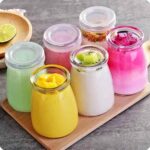 Durable glass jar with plastic lid for food storage