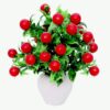 Artificial cherry plant with red berries in elegant pot