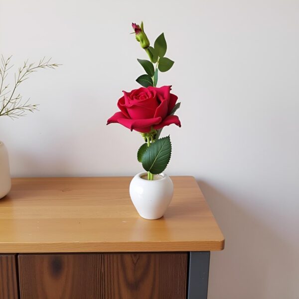 High-quality artificial red rose plant in pot for home décor