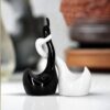 Stylish loving swan couple ceramic figurines with piano finish for home décor