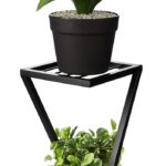 Stylish metal plant stand in Z shape for modern indoor plant display