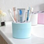 Strong bathroom toothbrush holder with stable base for daily use