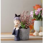 Artistic girl with basket centerpiece for interior décor