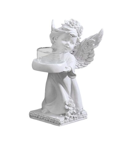 White angel statue candle holder with detailed wings and classic design