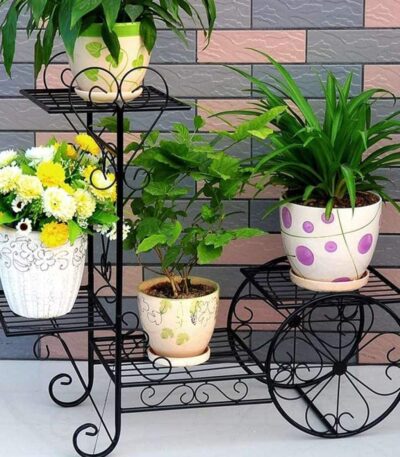 Vintage style plant stand trolley display with metal frame